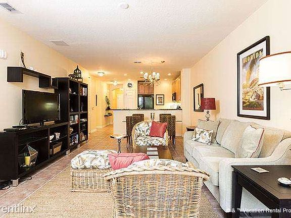 Stretch out & get comfy in the open, airy living room