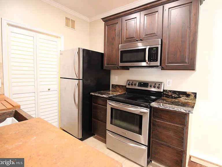 1570 Spring Gate Dr #7113 — Photo 1