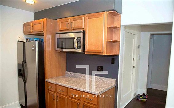 1st image of 6457 N California Ave #1