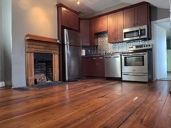 Pine flooring throughout, stainless steel appliances, come enjoy this spacious kitchen.