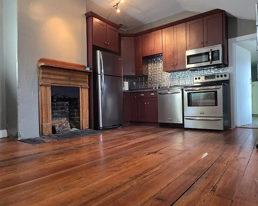 Pine flooring throughout, stainless steel appliances, come enjoy this spacious kitchen.