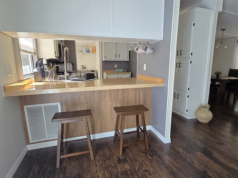 Kitchen
"Functional and welcoming kitchen with plenty of storage space."
