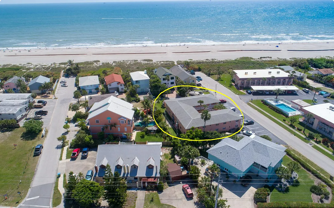 Charming coastal property just steps from the beach, surrounded by quiet streets and nearby homes, perfect for relaxed seaside living. - 610 Jefferson Ave #6