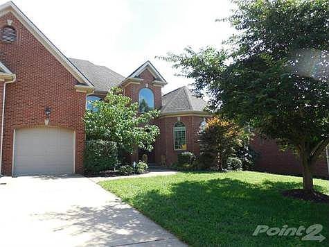 Home sits on a 14,000 square ft lot.