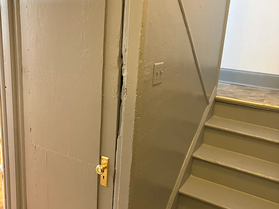 As you enter from the street into the common hallway the first door on the left is the door to the clean basement with a great washer and dryer convenient for all tenants.