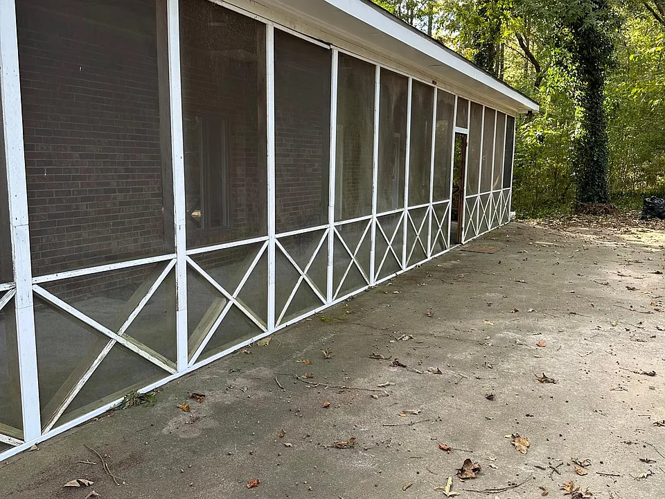 Screen in back porch - full length of house