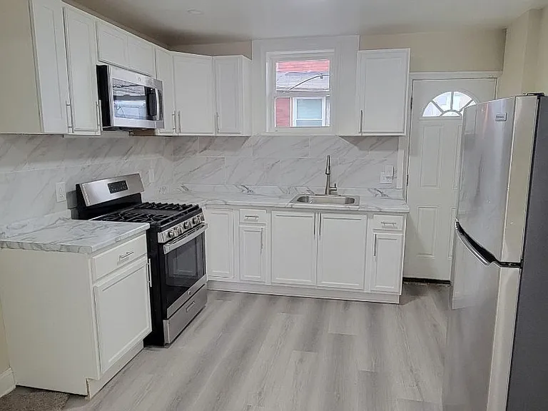 3833 N Delhi St — Photo 4
