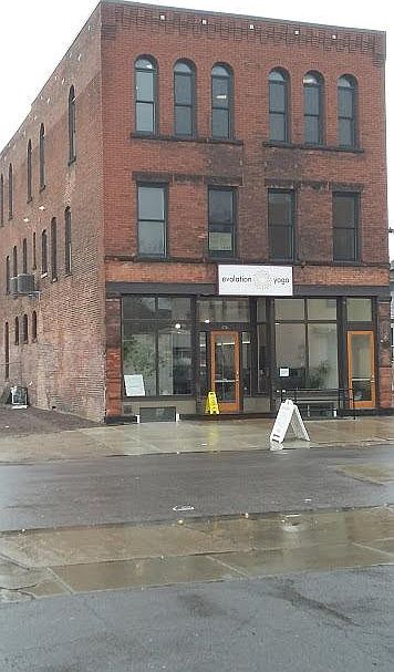Main apartment entrance is to the right of the yoga studio.