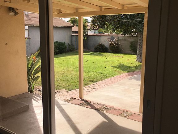 View to backyard from living dinning room area.