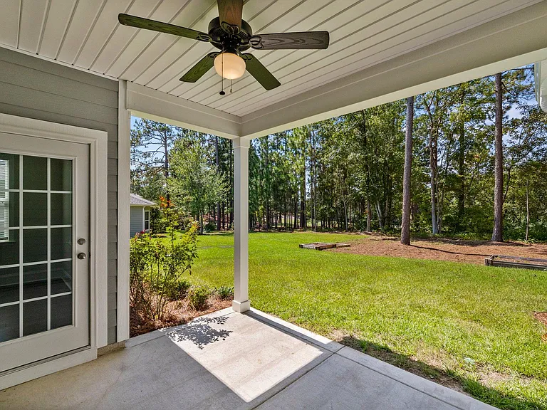 View from porch towards golf course.
PLEASENOTE. THIS PATIO IS NOW COMPLETELY SCREENED IN.