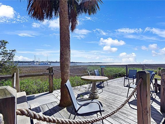 deck overlooking marsh, ocean and marina.