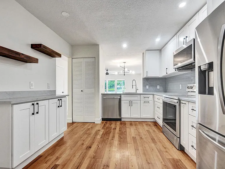 3407 Deer Creek Palladian Cir — Photo 11