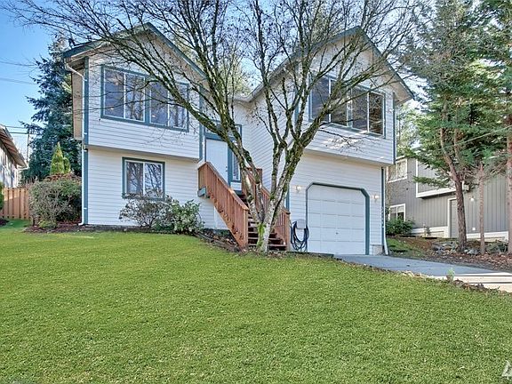 Large front yard & fully fenced backyard with gated entry.