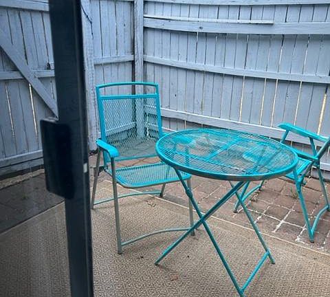 10 X 10 patio. Access through sliding glass doors from dining area.