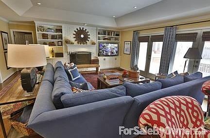 Eat-in banquette with storage beneath
						:
						Sunny dining area with great light fixture, mud room style entry from garage