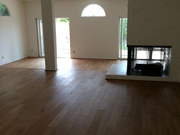 from LR looking toward stepdown den and patio door