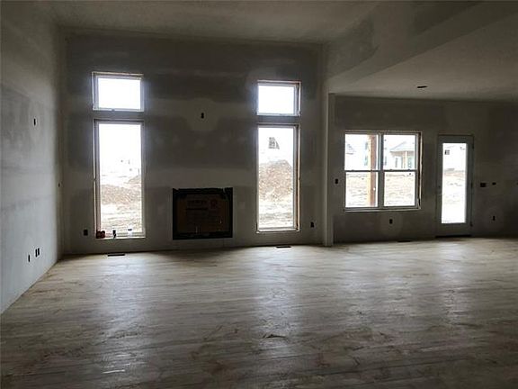 ACTUAL PICTURE 1.31.21 - UNDER CONSTRUCTION - HARDWOOD FLOOR WAS JUST INSTALLED - GREAT ROOM