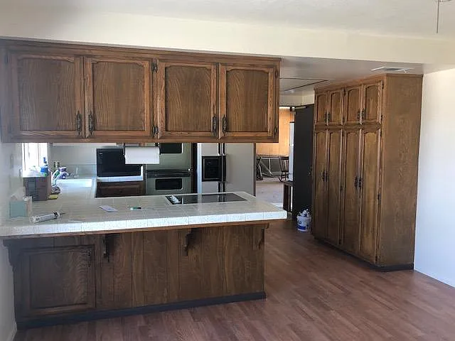 Double Oven & Refrigerator in Kitchen