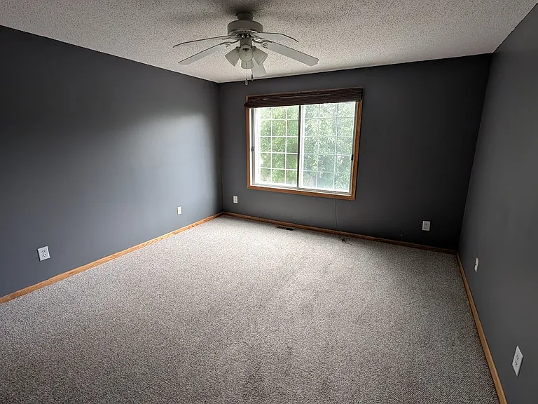 bedroom 1 with walk in closet