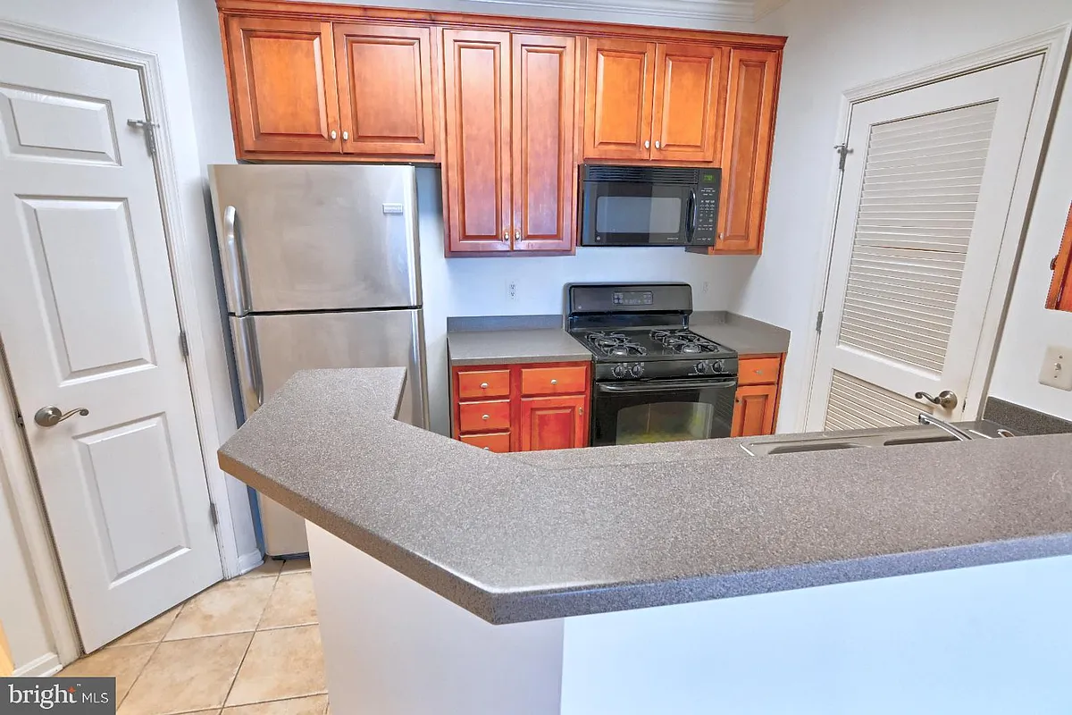 Building Photo - 21216 McFadden Sq #108