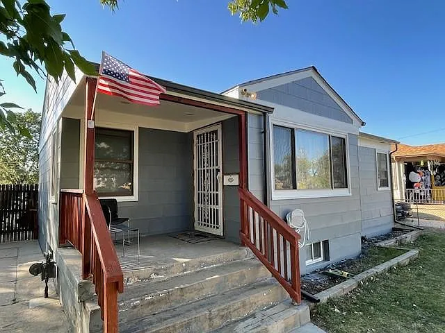 front entrance with porch and redwood railing