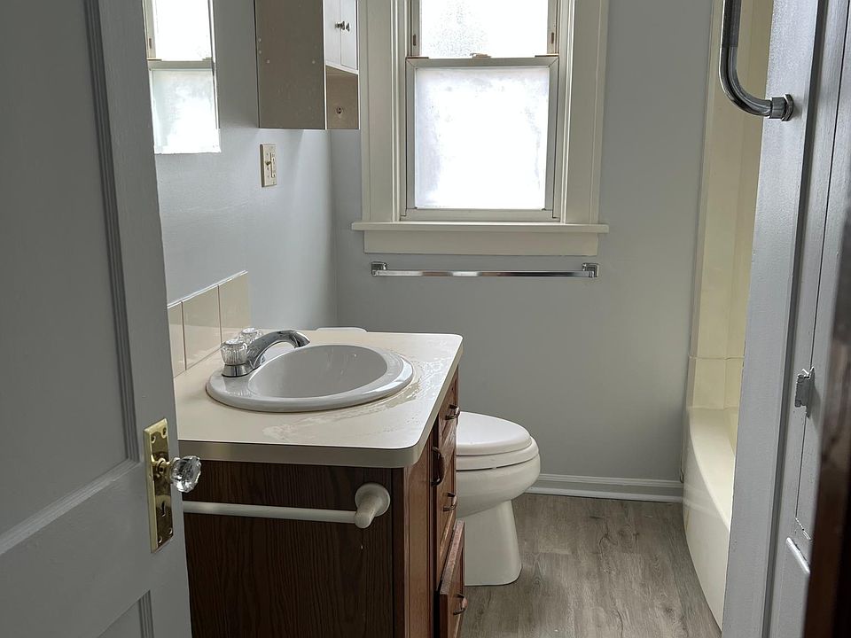 Bathroom- new flooring and includes a linen closet.