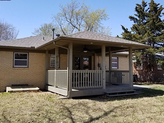 Back yard with beautiful covered porch