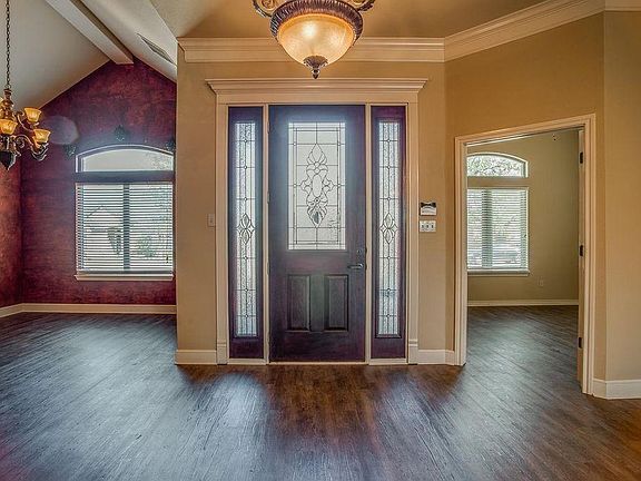 Formal dining to the left; entry door; office on the right