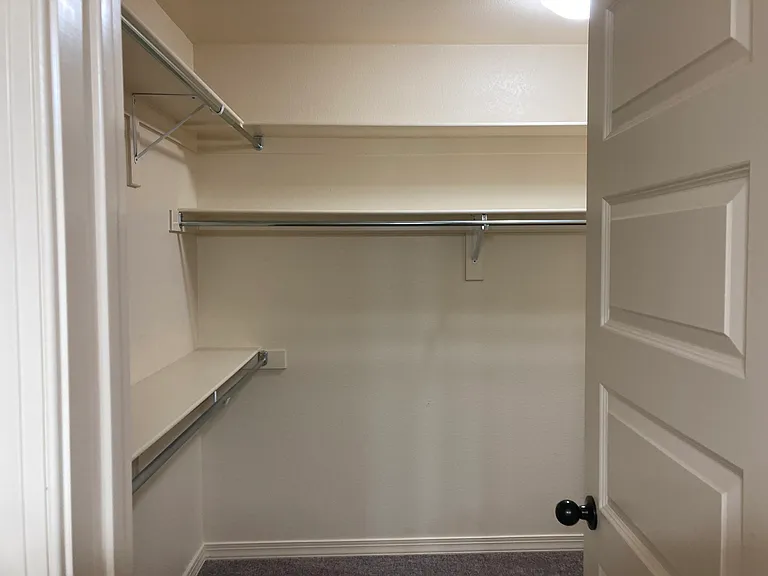 Entry to Large Walk-In Closet from Master Bath