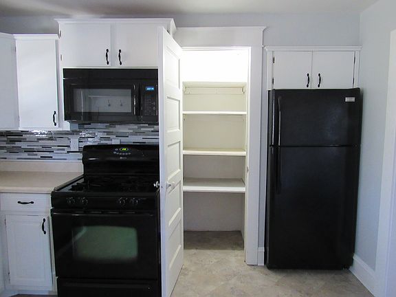 Kitchen with Open Pantry View