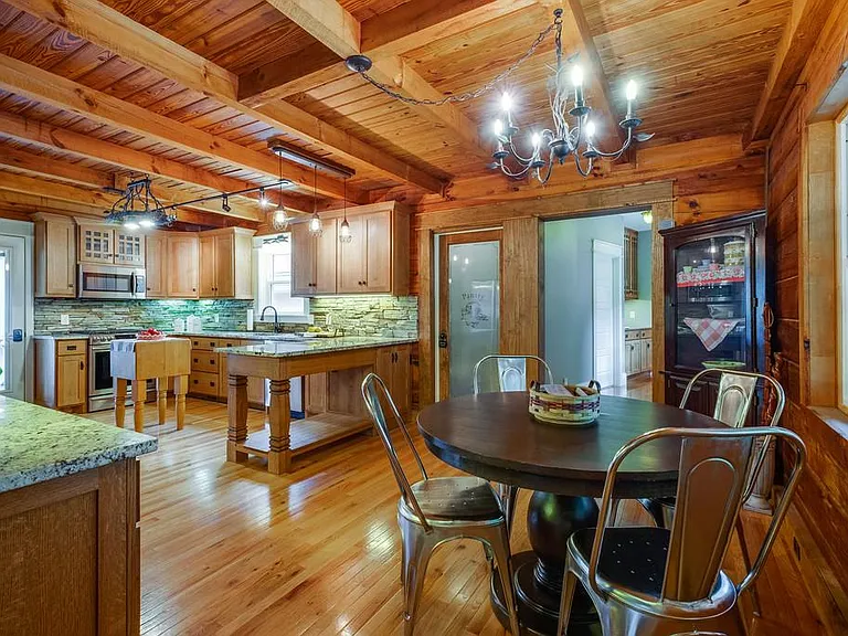 Gourmet kitchen with breakfast table and seating for four.