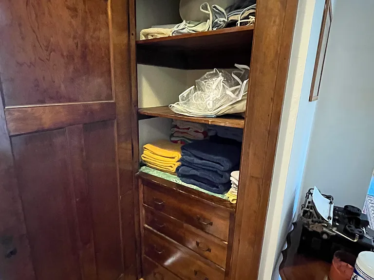 Huge linen closet with built-in dresser