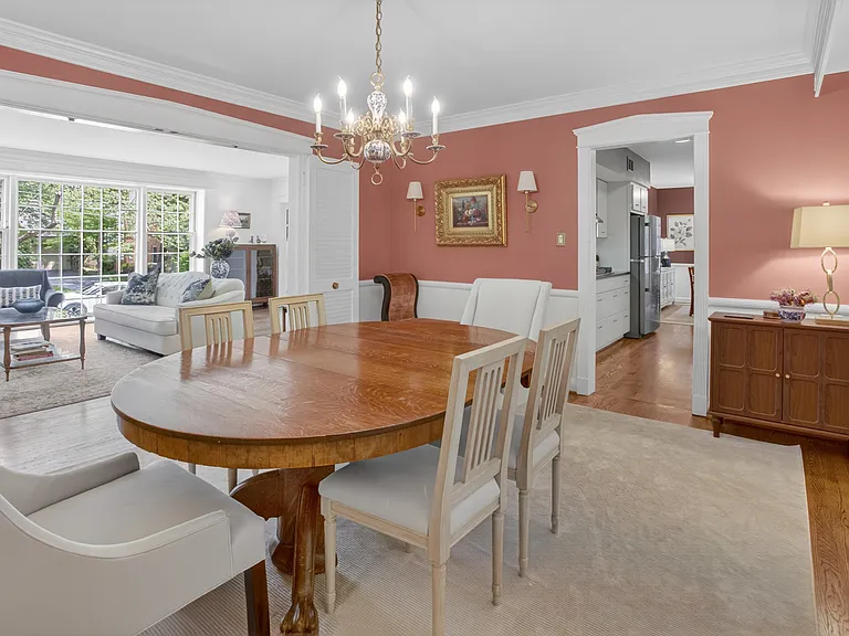 Dining room with view of living room and kitchen.