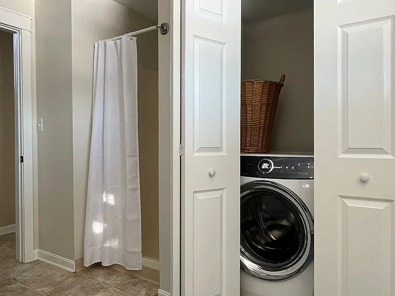 Downstairs bathroom with laundry (floors have been re-done since photo)