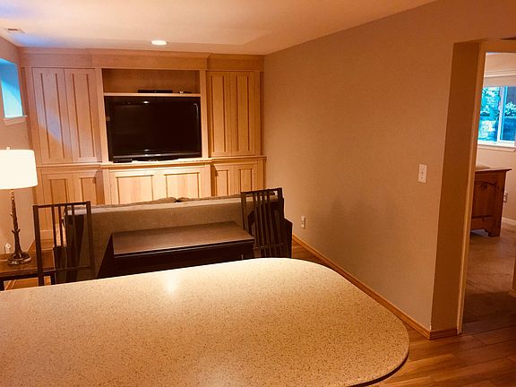 Beautiful built-in cabinet with space for 46"tv. Pullout desk below tv for working at home.