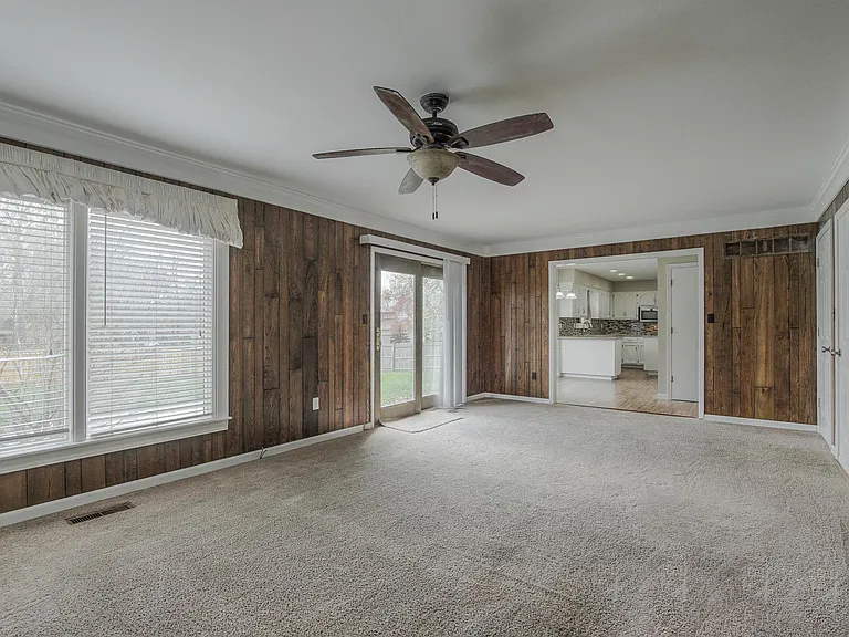 COMING: NEW CARPET, PANELING REMOVED.