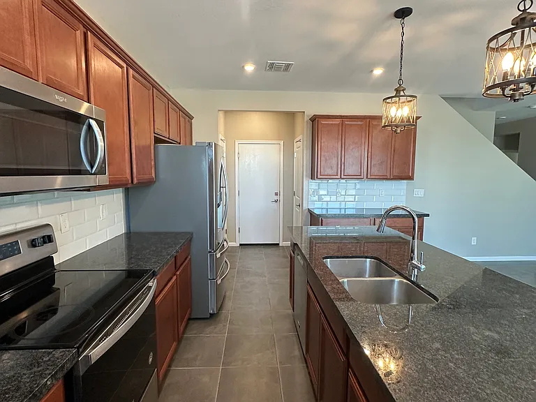 17851 W Daley Ln — Photo 8