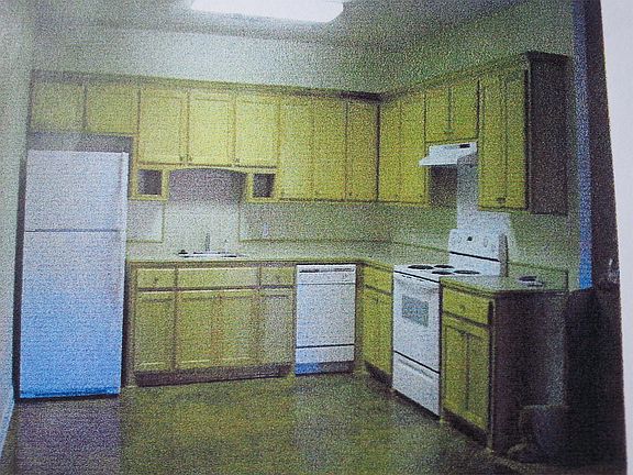 Open concept kitchen, dining and living room