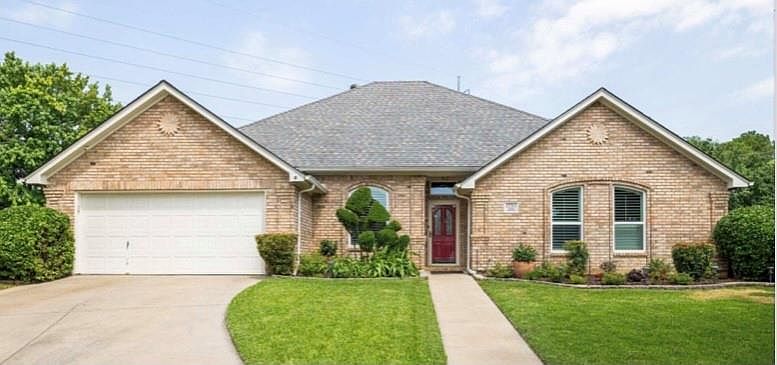 Front View - Home sits at the end of a culdesac! Extra Large Lot & Beautifully Landscaped!