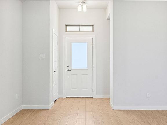 Entryway in the Ash home plan by Trophy Signature Homes - REPRESENTATIVE PHOTO