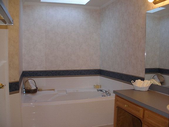 Skylight and whirlpool tub upgrades in the Master Suite