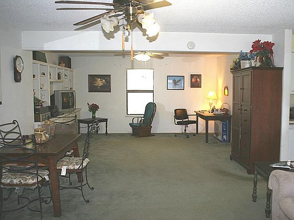 Living Room Features Built In Entertainment Center/Bookcases