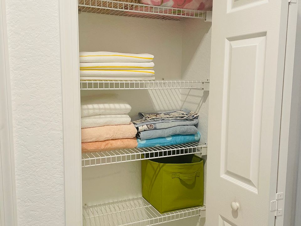 Hall closet near the 2nd and 3rd bedroom and office