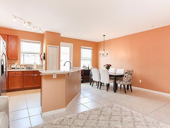 Looking to kitchen & dining room from family room.