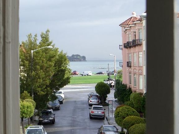 Looking out living room window; views of bay and Alcatraz Island.