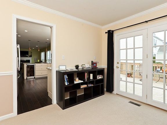 Dining room with French doors leading to new outdoor deck