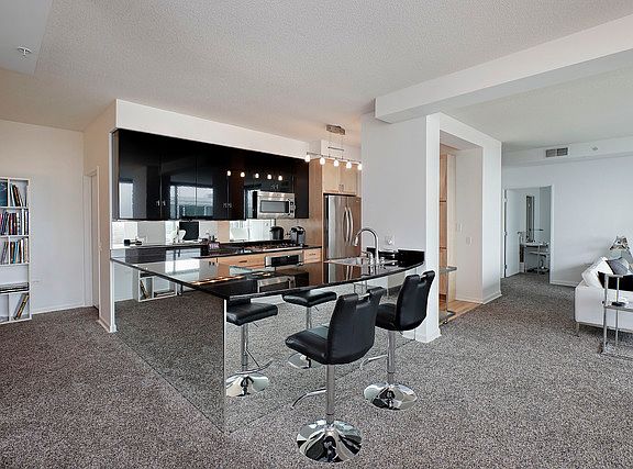 2nd image of 9715 Woods Dr #200406