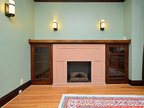 Gorgeous Fireplace w Shelves
