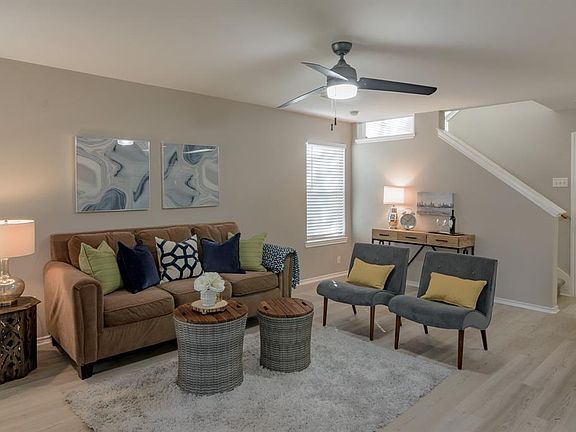 New light toned, wood-look luxury vinyl flooring was recently installed throughout the downstairs.