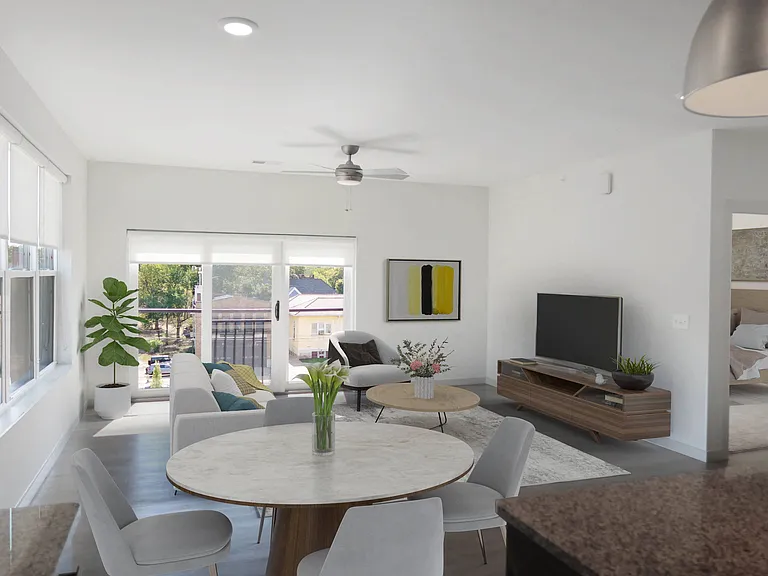 Large Living Areas with Wood Style Flooring, Ceiling Fans, and Lots of Natural Lighting